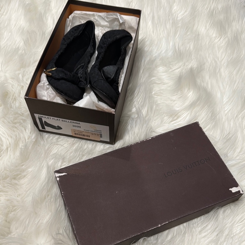 Louis Vuitton Black Ballet Flats worn a couple times.